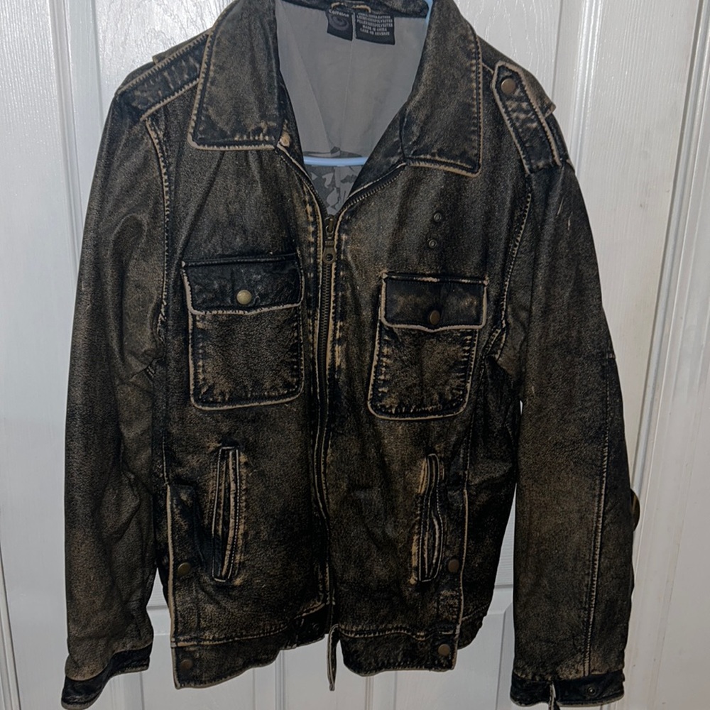 Vintage turn of the century caffeine leather coat.  New